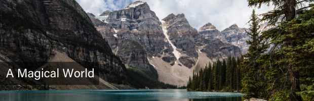 Mountains around a lake with text overlay reading, "A Magical World"