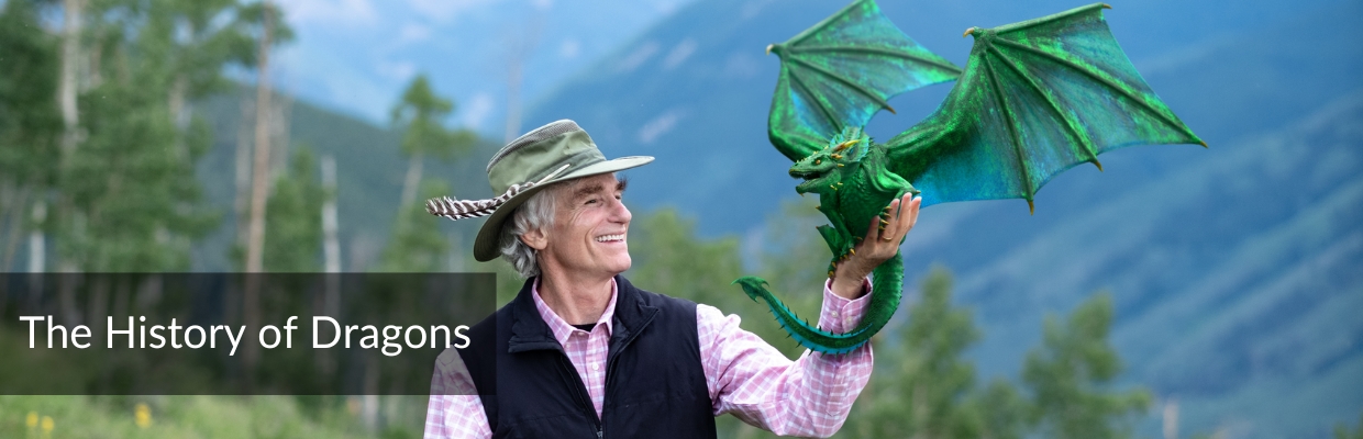 history-of-dragons-t-a-barron-custom-dragon-illustration_featured history of dragons: author T. A. Barron holding an illustrated dragon